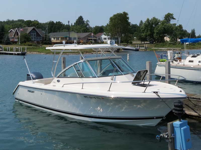 Photo: Pursuit 235 OS at marina in Detour Village, Michigan