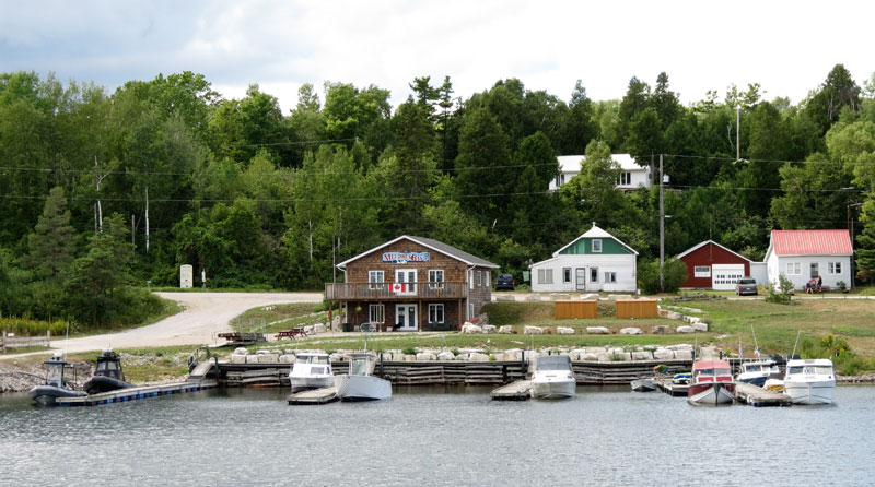 Photo: Telephoto view of Meldrum Bay, Manitoulin Island, Ontario, as seen from break wall.