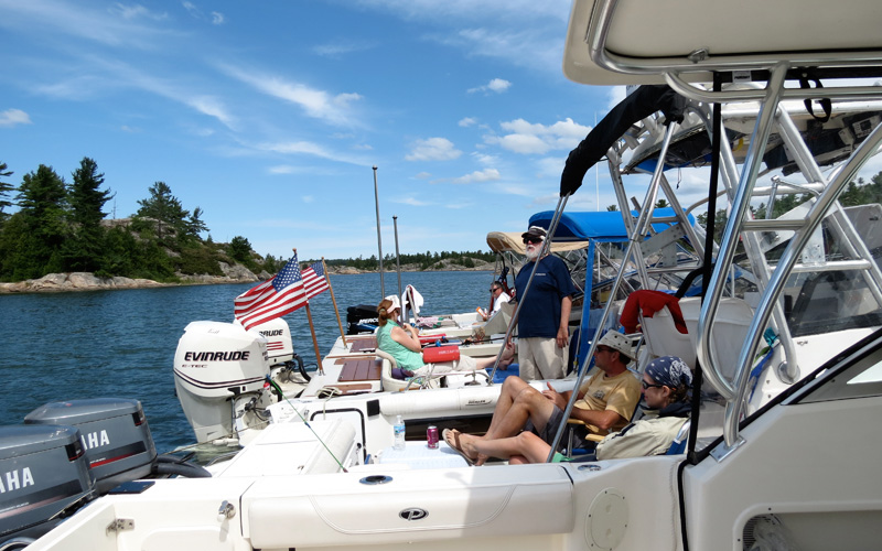 Photo: Boats rafted for lunch in fair weather