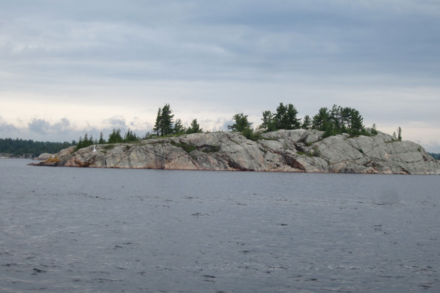 Photo: Line of boats transiting Little Detroit, Whalesback Channel, Aird Island east end.