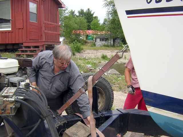 Photo: Sailboat loading onto trailer for portage at Swisha