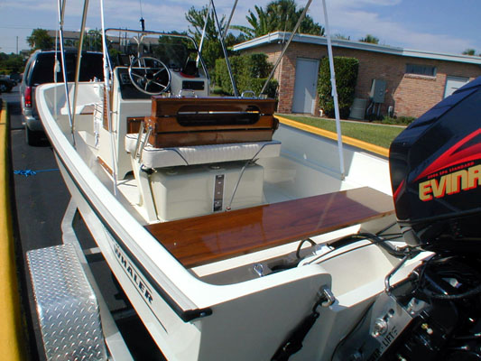 Photo: Whaler 17 Montauk stern view of restored boat with bracket mounted engine