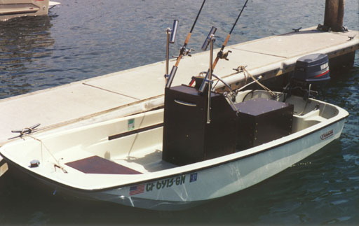 [Photo: 1978 Whaler 13 with home made center console]