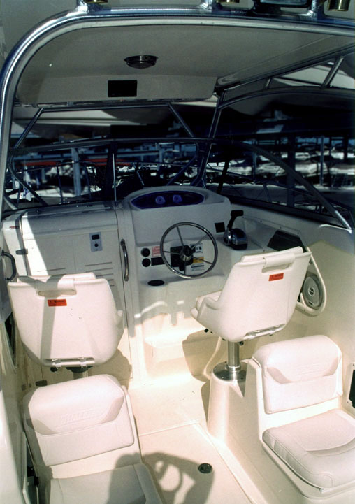 Photo: 2002 255 Conquest cockpit showing helm console and seating 