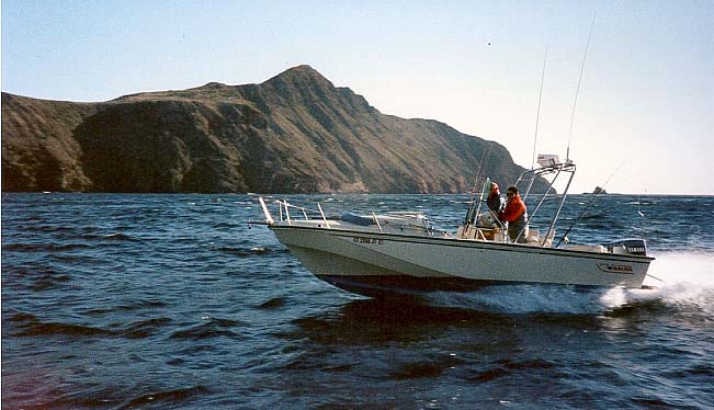Photo: 22 Outrage Cuddy at sea with Anacapa Island in background