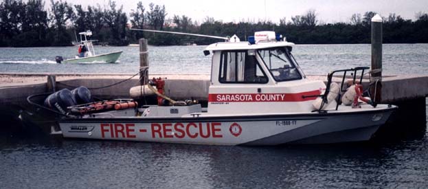 Photo: 25-Frontier Rescue Boat with Whaler Drive, in water, profile view