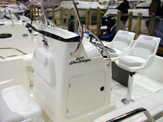 Photo: 2002 Boston Whaler 210 Outrage view of center console and seats