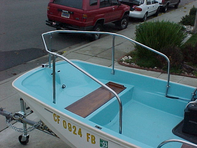 Photo: 1962 13-Sport on trailer; view of bow with OEM railing