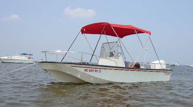 Photo: 1999 17-Standard built into Montauk trim in water; view from bow showing lowered bow railing