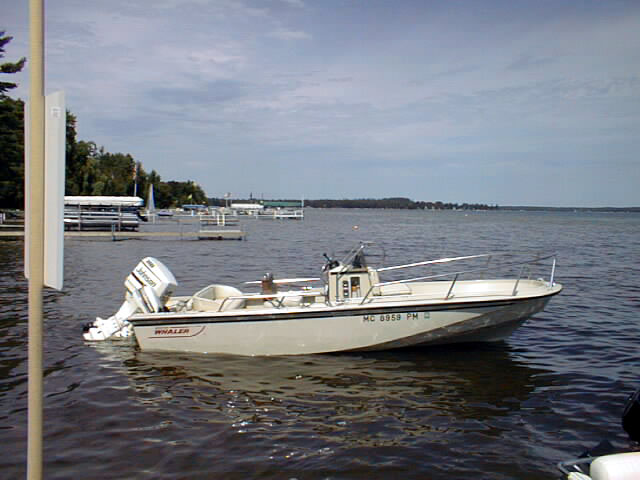 Photo: Boston Whaler 18-Outrage with RPS, Rear Seat, Auxillary outboard