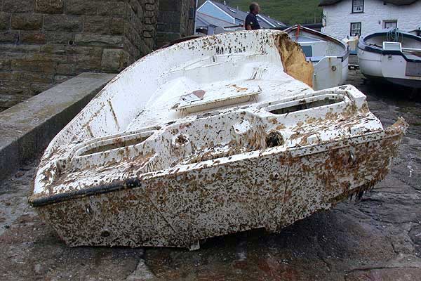 Photo: Derelict Boston Whaler on beach in Great Britain