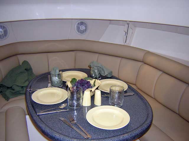 Photo: 2004 Boston Whaler 305 CONQUEST cabin with table rigged
