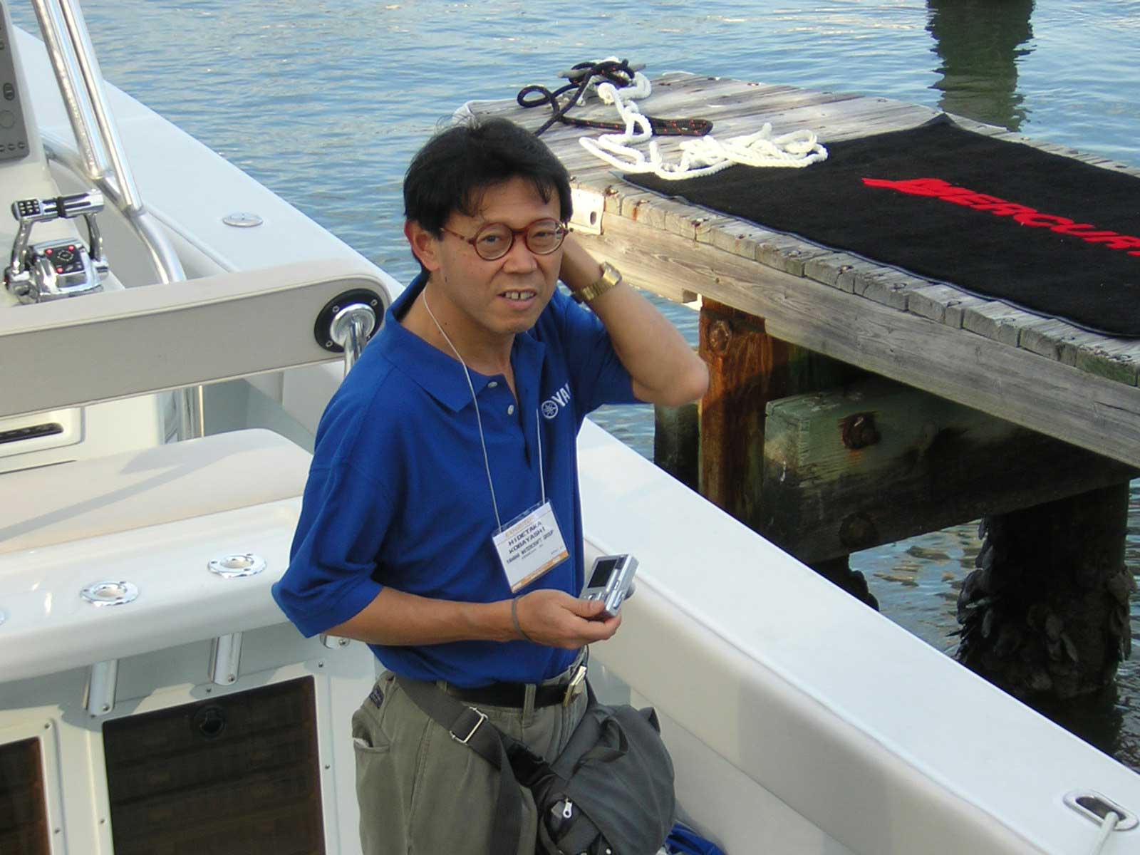 Photo: Mercury Verado Engine at On-Water Test Drive Dock--Yamaha Engineer taking pictures