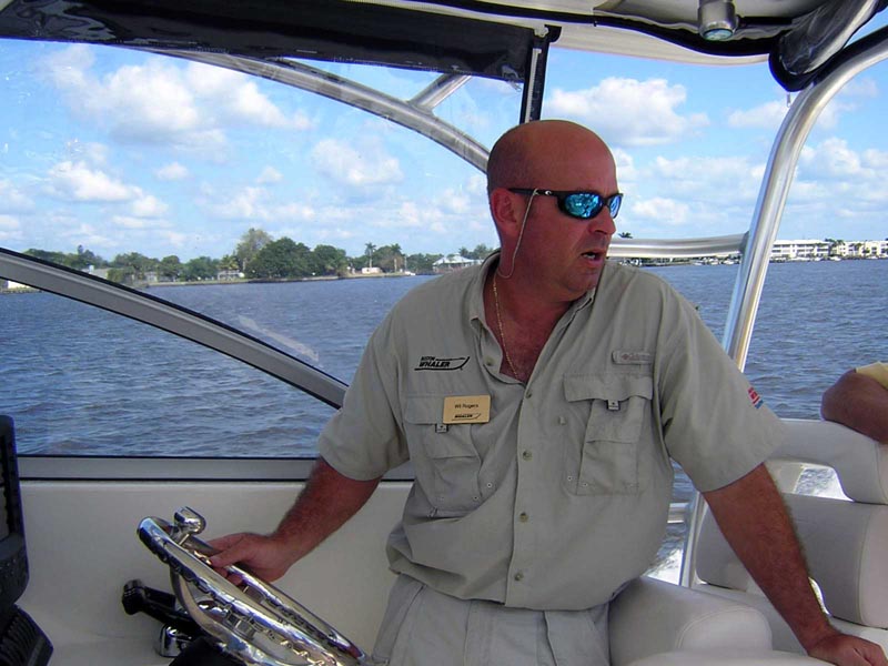 Photo: Wil Rogers at helm of Boston Whaler 305 CONQUEST