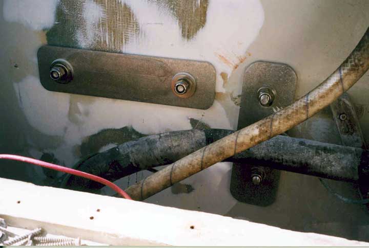Photo: Inboard side of transom of Boston Whaler WHALER-27 showing mounting bolts