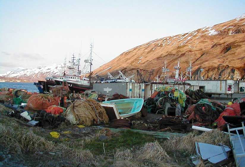 Photo: Dutch Harbor, Alaska, boneyard with abandoned 13-foot Boston Whaler boat