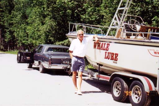 Photo: 1989 Whaler 25 Outrage on trailer with owner Larry Goltz