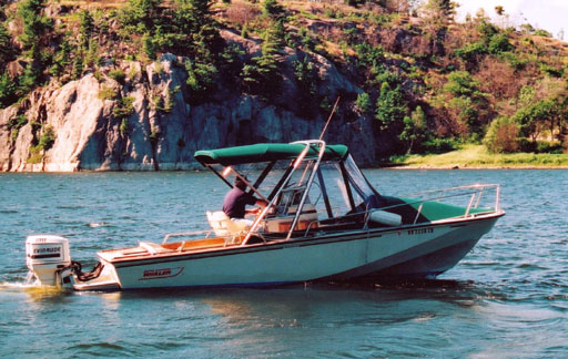 [Photo: c.1988 Whaler 22 Outrage in Collins River Inlet]