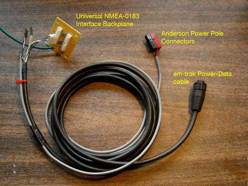 Photo: em-trak power and data cable terminated in 5-pin header connector and Anderson Power Pole connectors.