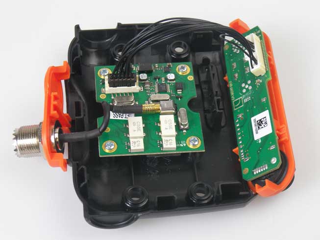 View of em-trak R100 AIS receiver with case opened to show internal components.