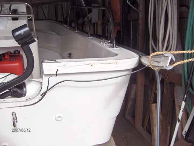 Photo: Stern view of Boston Whaler 170 MONTAUK hull showing transom with rub partially removed.