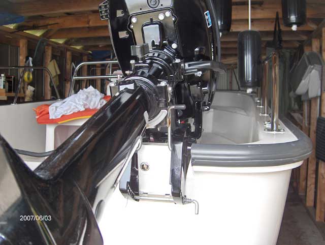 Photo: Stern view of Boston Whaler 170 MONTAUK hull showing final installation with restored gel coat finish.