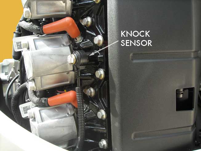 Photo: location of knock sensor on 3.3-liter V6 E-TEC engine.