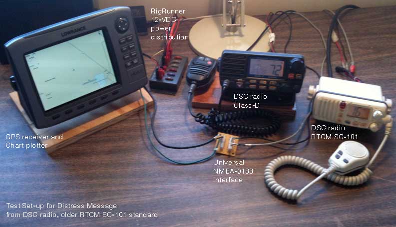 Photo: Test bench with Lowrance HDS-8, Standard Horizon GX1500S, and ICOM IC-M402.