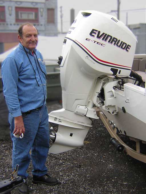 [Photo: David Zammitt and Evinrude 225-HP E-TEC Outboard]