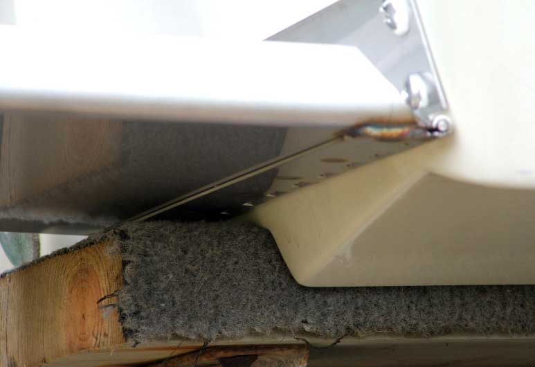 Photo: Trim tab installation on Outrage 18 with twin engines.