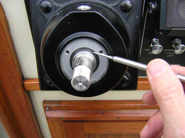 [Photo: Close-up of helm pump showing seal]