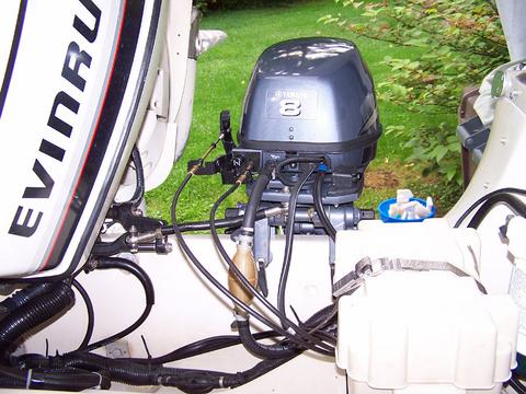 [Photo: Evinrude 225-HP Motor Tilted Up]