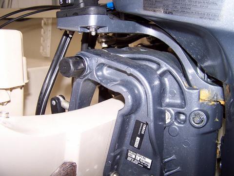 [Photo: Close up of auxiliary engine mounting bracket on transom.]