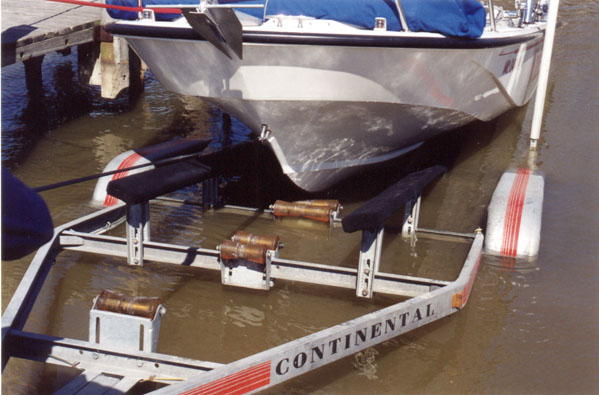 Photo: Launch ramp with courtesy dock, loading on keel roller trailer